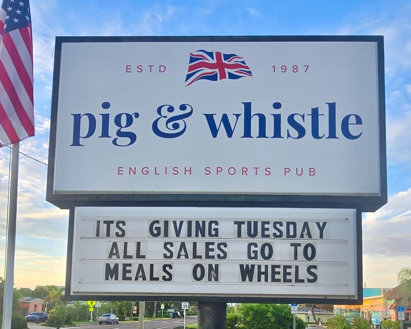 pig and whistle sign announcing meals on wheels fundraiser giving tuesday
